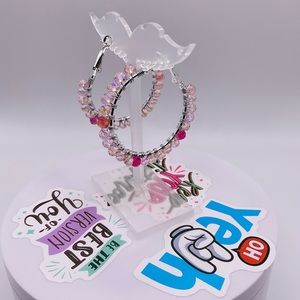 Pink earrings wrapped